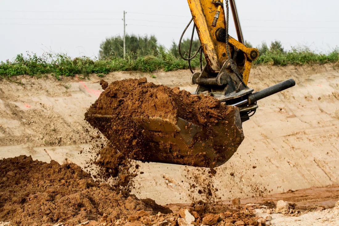Excavation and dirt work in progress on a Montgomery County property